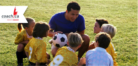 soccer coach and team